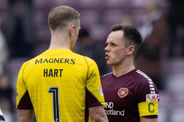Celtic's Joe Hart and Hearts' Lawrence Shankland exchange words.