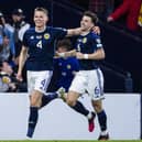 Scotland duo Scott McTominay and Kieran Tierney celebrate the second goal in the 2-0 win over Spain. (Photo by Ross MacDonald / SNS Group)