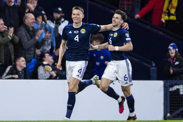 Scotland duo Scott McTominay and Kieran Tierney celebrate the second goal in the 2-0 win over Spain. (Photo by Ross MacDonald / SNS Group)
