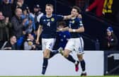 Scotland duo Scott McTominay and Kieran Tierney celebrate the second goal in the 2-0 win over Spain. (Photo by Ross MacDonald / SNS Group)