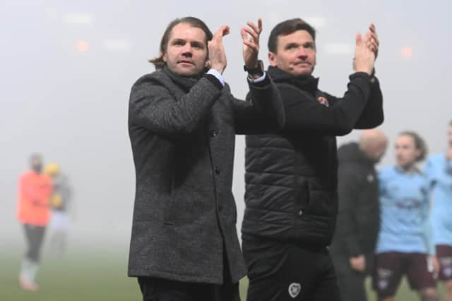 Hearts manager Robbie Neilson and assistant Lee McCulloch applaud the Hearts fans.