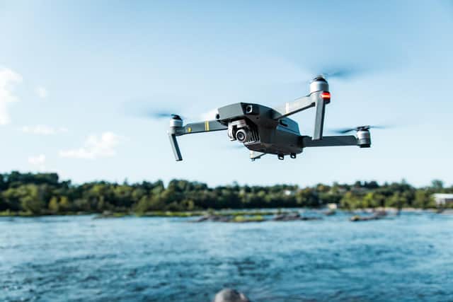 Drone over water collecting data