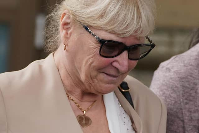 The widow of charity cyclist Tony Parsons, Margaret Parsons, leaves the High Court in Glasgow. Picture: Andrew Milligan/PA Wire