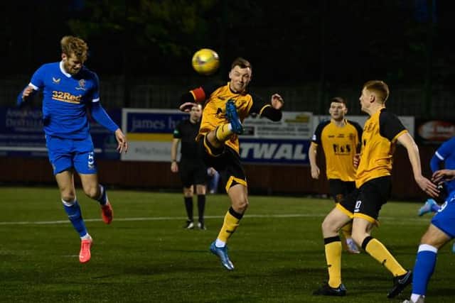 Filip Helander marks his comeback from injury by heading Rangers in front after seven minutes against Annan Athletic at Galabank. (Photo by Rob Casey / SNS Group)
