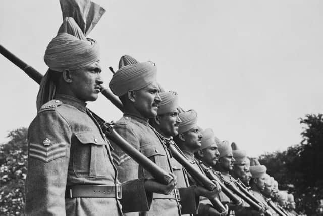 Soldiers of the Royal Indian Army Service Corps (RIASC) on parade in September 1940. (Picture: Fox Photos/Hulton Archive/Getty Images)