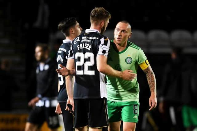 Celtic's Scott Brown with Marcus Fraser at full-time during the Scottish Premiership match between St Mirren and Celtic (Photo by Craig Foy / SNS Group)