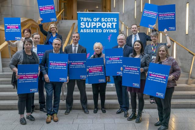 Scottish Liberal Democrat MSP Liam McArthur (centre, left), alongside other MSPs, during a media event at the Scottish Parliament in Edinburgh, after publishing his Assisted Dying for Terminally Ill Adults (Scotland) Bill. Photo: Jane Barlow