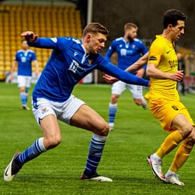 St Johnstone defender Liam Gordon battles with Jason Holt for possession in the recent victory for Callum Davidson's men over Livingston. Picture: SNS