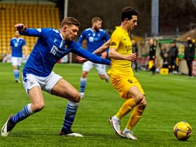 St Johnstone defender Liam Gordon battles with Jason Holt for possession in the recent victory for Callum Davidson's men over Livingston. Picture: SNS