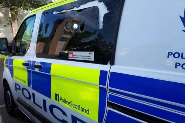 A man wearing a balaclava grabbed a 16-year-old girl as she walked through a park.