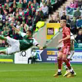 Hibs' debutant Mykola Kukharevych tries an acrobatic effort on goal during the 3-1 win over Aberdeen at Easter Road on Saturday.  (Photo by Paul Devlin / SNS Group)