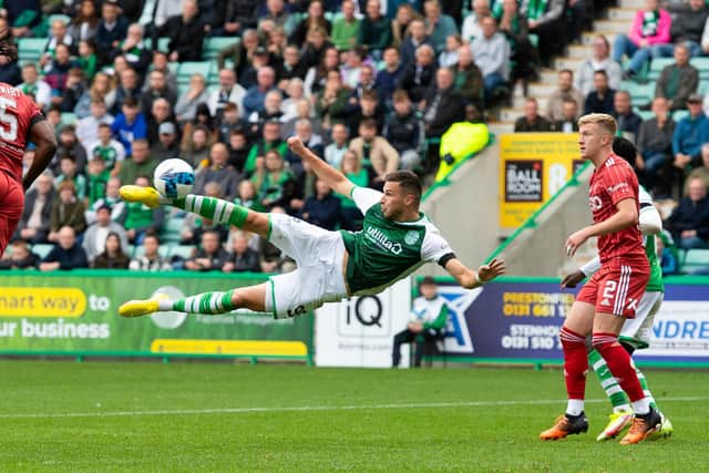 Hibs' debutant Mykola Kukharevych tries an acrobatic effort on goal during the 3-1 win over Aberdeen at Easter Road on Saturday. (Photo by Paul Devlin / SNS Group)