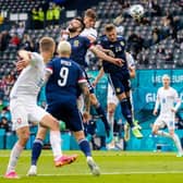 Czech Republic striker Patrik Schick rises above Scotland defender Grant Hanley to head home the first goal of the Group D opener at Hampden. (Photo by Craig Williamson / SNS Group)