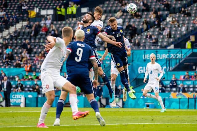 Czech Republic striker Patrik Schick rises above Scotland defender Grant Hanley to head home the first goal of the Group D opener at Hampden. (Photo by Craig Williamson / SNS Group)