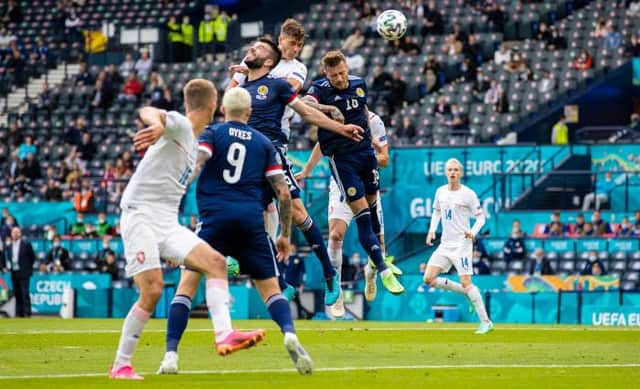 Czech Republic striker Patrik Schick rises above Scotland defender Grant Hanley to head home the first goal of the Group D opener at Hampden. (Photo by Craig Williamson / SNS Group)