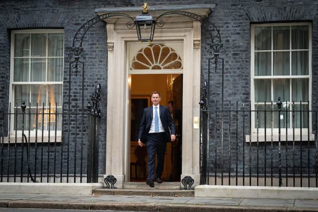 Jeremy Hunt leaves 10 Downing Street in London after he was appointed Chancellor of the Exchequer following the resignation of Kwasi Kwarteng. Picture date: Friday October 14, 2022. PA Photo. The Chancellor flew back early from International Monetary Fund talks in Washington on Friday to be informed of his fate in a brief meeting with the Prime Minister, it was reported. See PA story POLITICS Tory. Photo credit should read: Stefan Rousseau/PA Wire