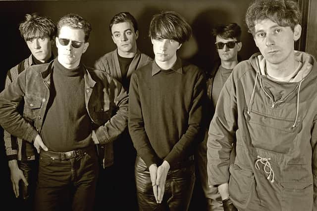 Primal Scream (l-r: Martin St John, Paul Harte, Robert Young, Bobby Gillespie, Tom McGurk and Jim Beattie) photographed in Stepney, London, on 4 December 1985 by Bleddyn Butcher