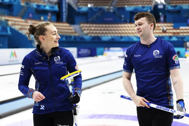 Jen Dodds and Bruce Mouat are all smiles after qualifying for World Mixed Doubles Curling Championship knock-out stages.