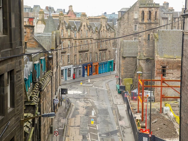 The usually bustling Cowgate was deserted.