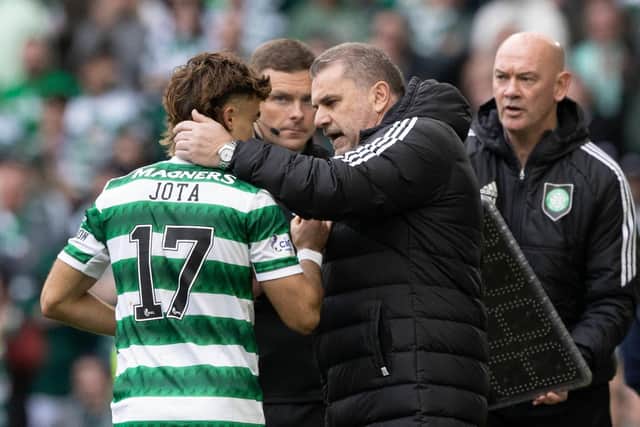 Celtic manager Ange Postecoglou embraces Jota as he substituted off during the win against Rangers.