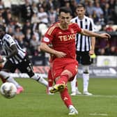Bojan Miovski scores a late penalty to earn Aberdeen a draw against St Mirren.