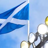 The Scottish flag above Hampden Park, where the SPFL may soon usher in change.