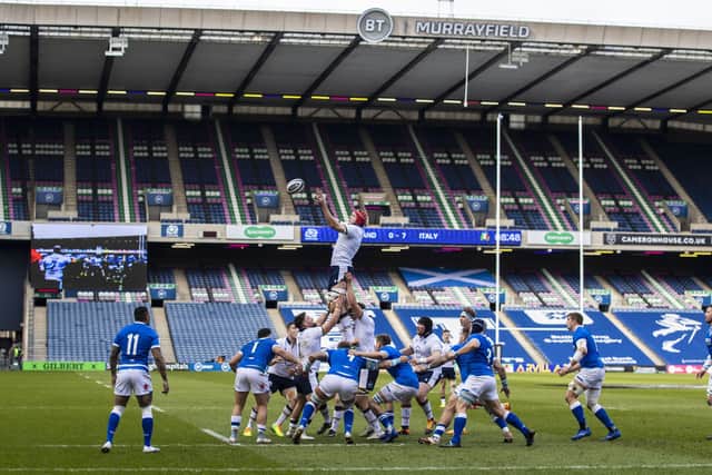 Grant Gilchrist, in the red scrum cap, played a big part in Scotland's lineout dominance against Italy. Picture: Craig Williamson/SNS