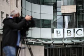 A member of the media outside BBC Broadcasting House in central London. Picture: Henry Nicholls/AFP via Getty Images