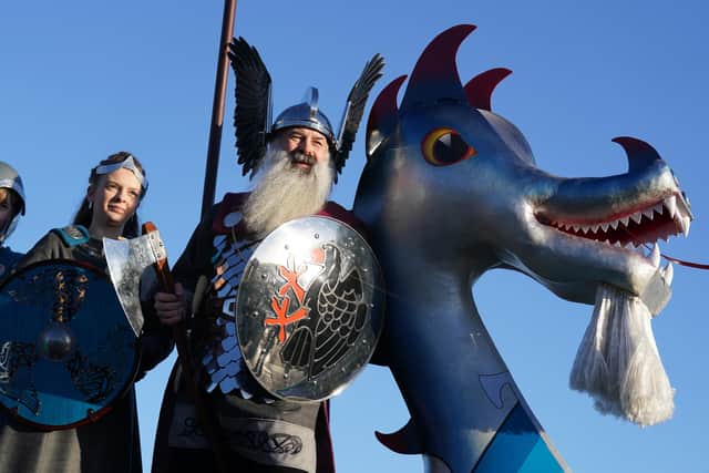 Jarl Squad member Jen Moar alongside her dad Guizer Jarl Richard as they take part in Up Helly Aa in Lerwick . PIC: Andrew Milligan/PA Wire