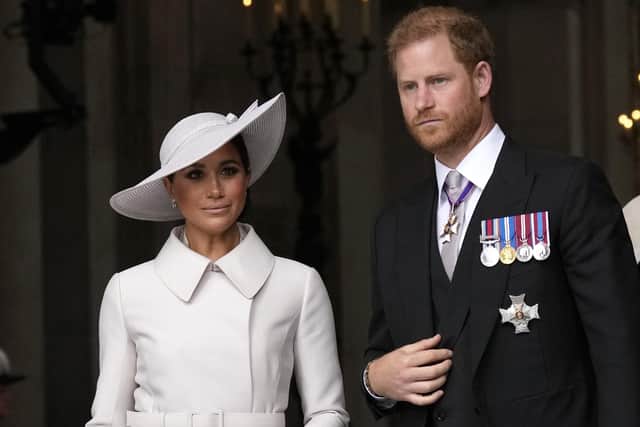 Prince Harry and Meghan, Duchess of Sussex leave after a service of thanksgiving for the reign of Queen Elizabeth II at St Paul's Cathedral in London. Picture: AP Photo/Matt Dunham, Pool