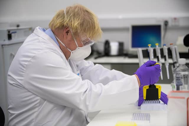 Prime Minister Boris Johnson visited the French biotechnology laboratory Valneva in Livingston in January. Picture: PA