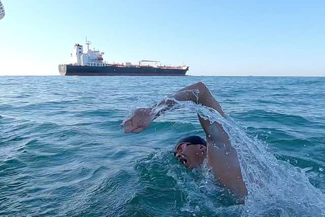 Andrew Donaldson swims the English Channel and sets a new British record by completing the crossing in 8 hours exactly. PIC: Andy Donaldson.