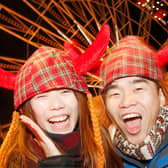 If Edinburgh is supposed to put on an authentic Scottish Hogmanay, why are the revellers served gluhwein? (Picture: Danny Lawson/PA)