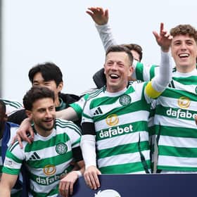 Callum McGregor (second left) leads the Celtic celebrations at Tannadice after another Premiership title triumph  (Photo by Craig Foy / SNS Group)