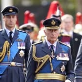 King Charles III and the Prince of Wales walk behind the coffin of Queen Elizabeth II during the ceremonial procession from Buckingham Palace to Westminster Hall (Picture: Andrew Matthews/PA Wire)