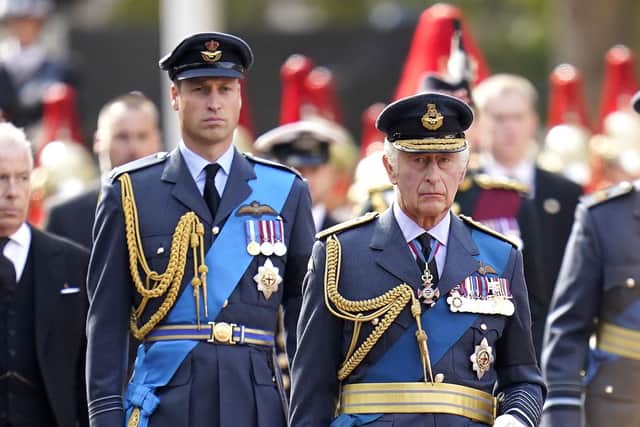 King Charles III and the Prince of Wales walk behind the coffin of Queen Elizabeth II during the ceremonial procession from Buckingham Palace to Westminster Hall (Picture: Andrew Matthews/PA Wire)