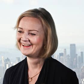 Prime Minister Liz Truss speaks to journalists at the Empire State Building in New York.