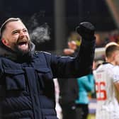 Dunfermline manager James McPake celebrates the win over Falkirk.