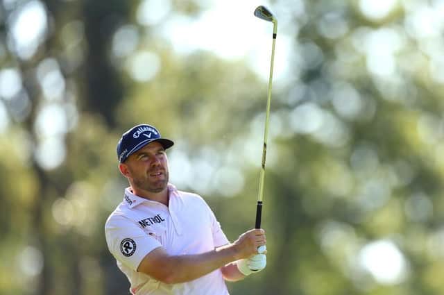Richie Ramsay plays his second shot on the ninth hole during day one of the BMW PGA Championship at Wentworth Club. Picture: Andrew Redington/Getty Images.