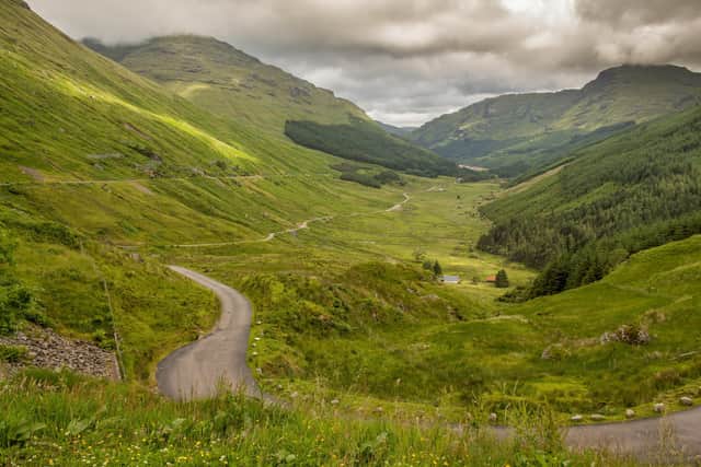 Campaigners want a more resilient diversion route built along the right hand (west) side of Glen Croe to take traffic away from the A83 (left) and single-track Old Military Road (centre). Picture: Jozef Durok/Getty