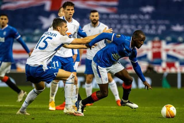 Glen Kamara breaks free of a challenge from Jakub Moder during Rangers' 1-0 win over Lech Poznan at Ibrox on Thursday night. (Photo by Alan Harvey / SNS Group)