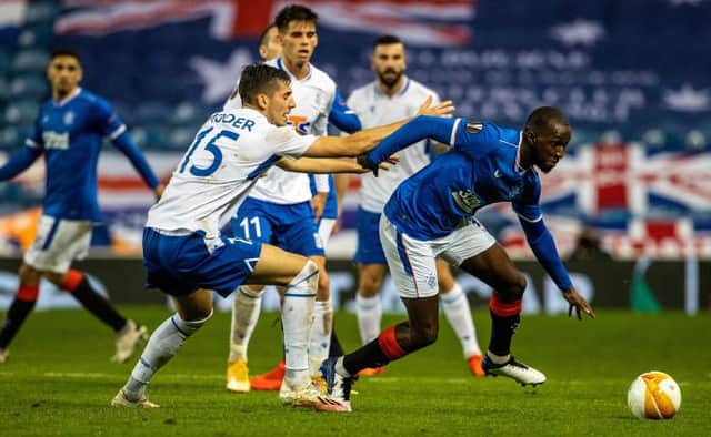 Glen Kamara breaks free of a challenge from Jakub Moder during Rangers' 1-0 win over Lech Poznan at Ibrox on Thursday night. (Photo by Alan Harvey / SNS Group)
