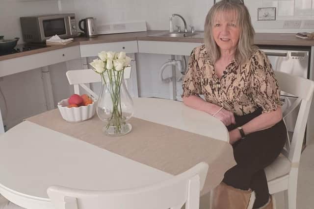 Gillian Macdonald in the kitchen of her new home