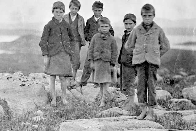 Barefooted boys at Poolewe. It is known that the children at Scoraig Public School walked to school with no shoes on. PIC: Ullapool Museum.