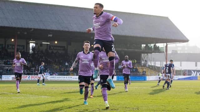 Rangers captain James Tavernier celebrates after scoring his team's second goal from the penalty spot in the 3-0 win over Dundee at Dens Park. (Photo by Alan Harvey / SNS Group)