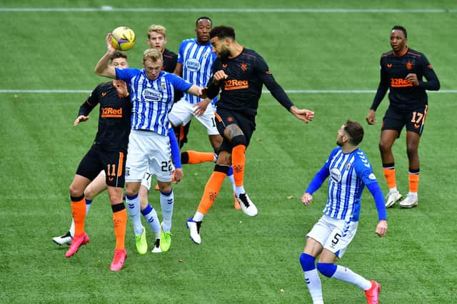 Connor Goldson' header is handled by Ross Millen to concede the penalty kick which James Tavernier converted to put Rangers ahead against Kilmarnock at Rugby Park. (Photo by Mark Runnacles/Getty Images)