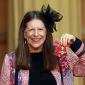 Anna Scher poses with her MBE after a  Buckingham Palace Investiture ceremony in October 2013 (Picture: Sean Dempsey - WPA Pool/Getty Images)