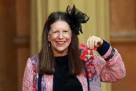 Anna Scher poses with her MBE after a  Buckingham Palace Investiture ceremony in October 2013 (Picture: Sean Dempsey - WPA Pool/Getty Images)