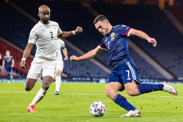 Scotland's John McGinn beats Israel's Eli Dasa to the ball during last month's play-off semi-final at Hampden Park (Photo by Craig Williamson / SNS Group)