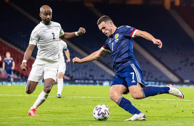 Scotland's John McGinn beats Israel's Eli Dasa to the ball during last month's play-off semi-final at Hampden Park (Photo by Craig Williamson / SNS Group)